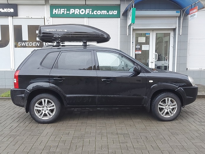 https://th.kh.ua/image/catalog/demo/product/box/tdbox/Hyundai_tucson_terra_drive_440_chern_gl_1.jpg
